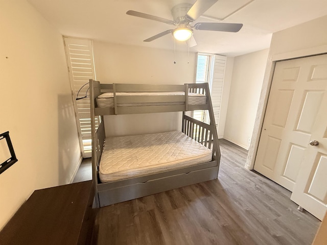 3660 Lower Honoapiilani Rd Unit 111, Lahaina, HI 96761 - bedroom featuring wood finished floors, ceiling fan, and baseboards