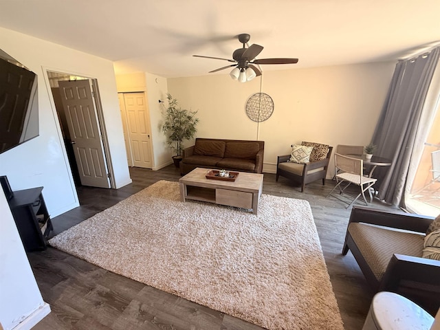 3660 Lower Honoapiilani Rd Unit 111, Lahaina, HI 96761 - living room with ceiling fan, dark wood finished floors, and baseboards