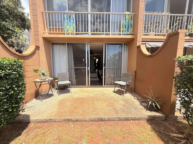 3660 Lower Honoapiilani Rd Unit 111, Lahaina, HI 96761 - back of property with a balcony and a patio