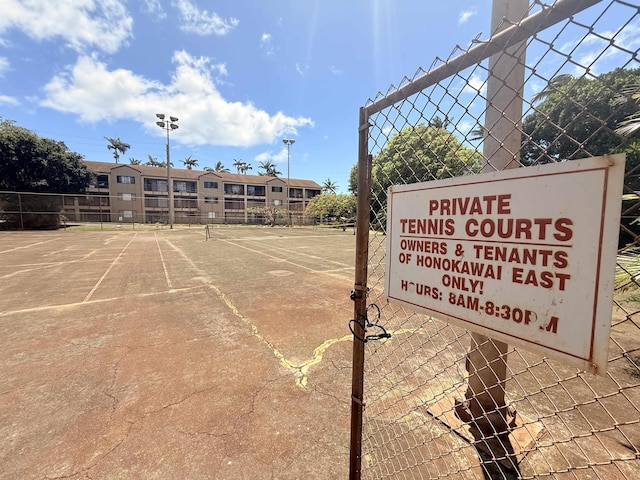 3660 Lower Honoapiilani Rd Unit 111, Lahaina, HI 96761 - view of tennis court featuring fence