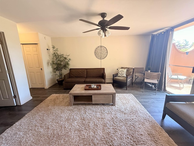 3660 Lower Honoapiilani Rd Unit 111, Lahaina, HI 96761 - living room featuring wood finished floors, a ceiling fan, and baseboards