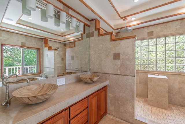 full bath featuring a walk in shower, tile walls, and a raised ceiling