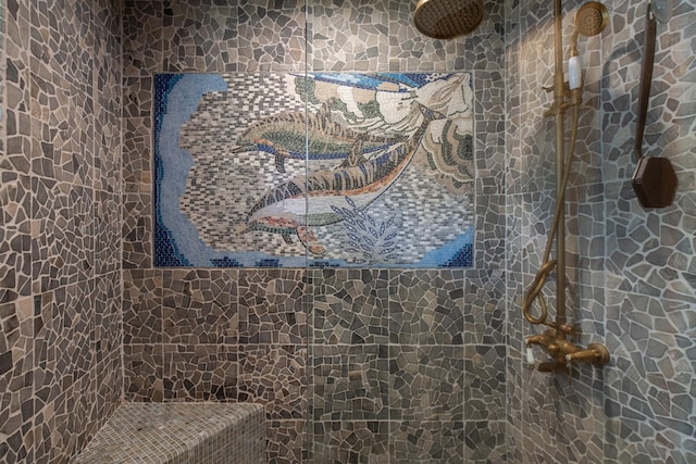 full bathroom featuring tiled shower