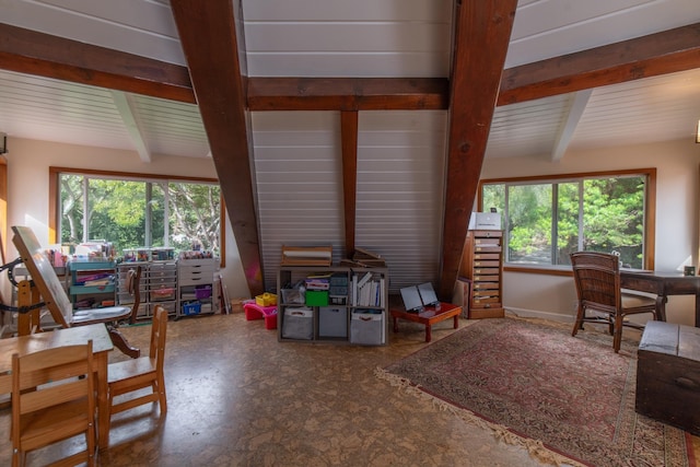 office area with lofted ceiling with beams