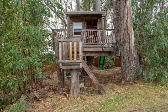 view of play area with a wooden deck