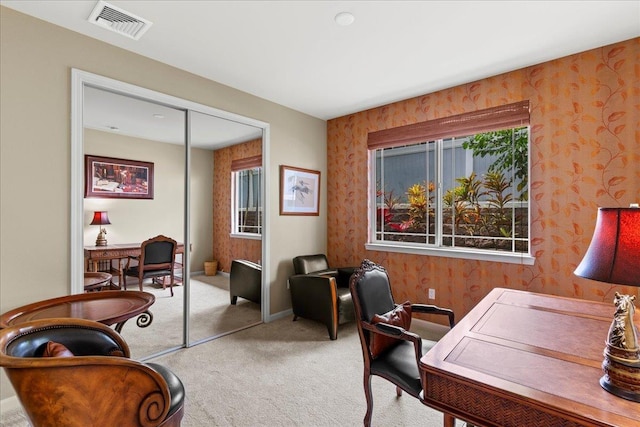 office featuring visible vents, carpet flooring, baseboards, and wallpapered walls