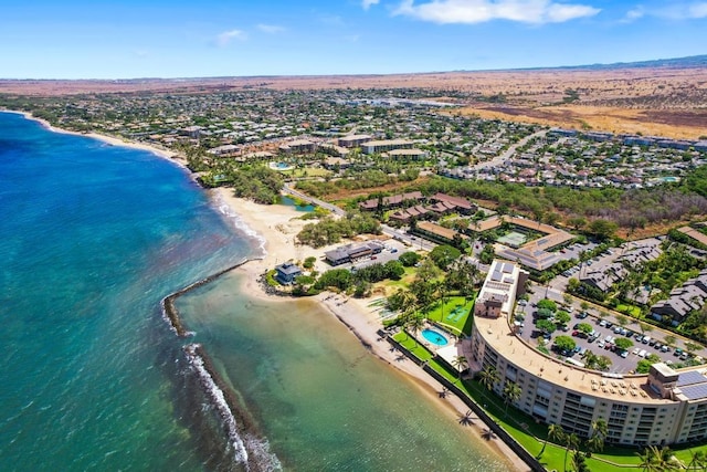 aerial view featuring a view of the beach and a water view