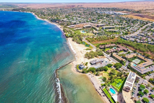 drone / aerial view with a view of the beach and a water view