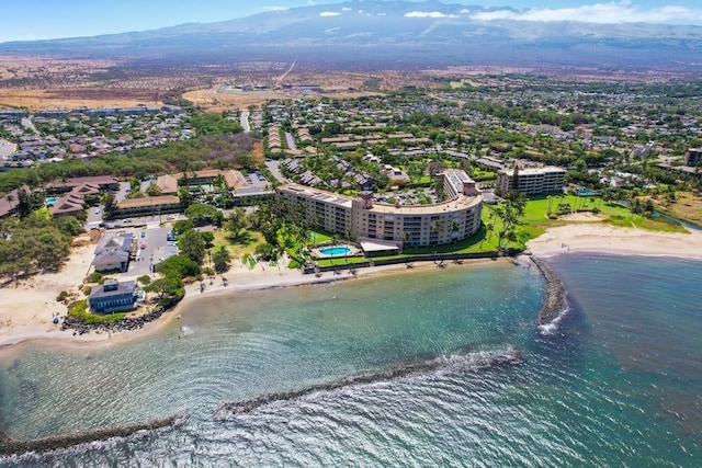 bird's eye view featuring a view of the beach and a water view