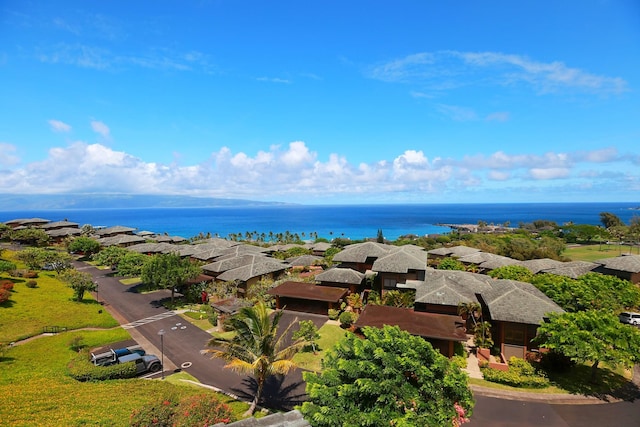 bird's eye view with a residential view and a water view