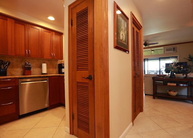 kitchen with a ceiling fan, dishwasher, backsplash, and light tile patterned floors