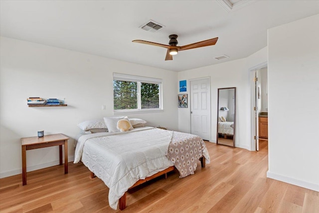 bedroom with ceiling fan and light wood-type flooring