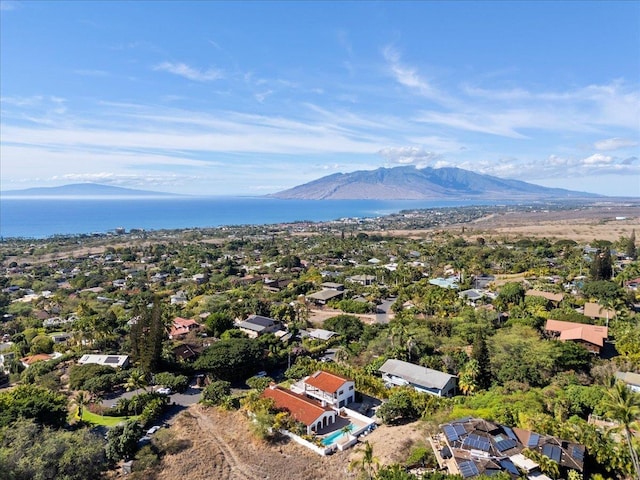 bird's eye view with a water and mountain view