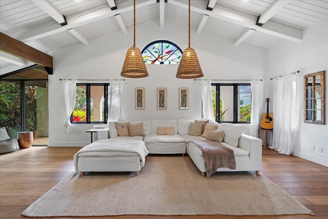 3291 Waileia Pl, Kihei, HI 96753 - living room with hardwood / wood-style floors, healthy amount of natural light, beamed ceiling, high vaulted ceiling, and baseboards