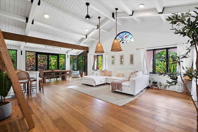 3291 Waileia Pl, Kihei, HI 96753 - living area with beamed ceiling, light wood-style flooring, high vaulted ceiling, and plenty of natural light