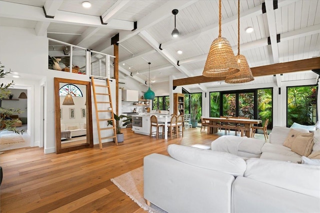3291 Waileia Pl, Kihei, HI 96753 - living room with plenty of natural light, beamed ceiling, light wood-type flooring, and high vaulted ceiling