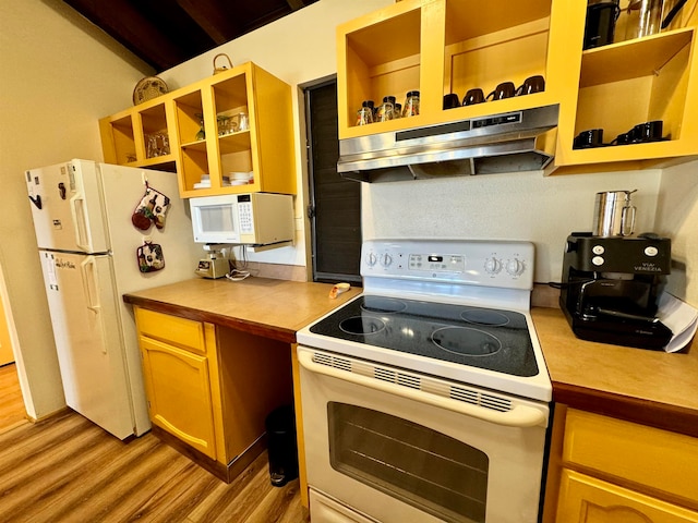 kitchen featuring light hardwood / wood-style floors and white appliances