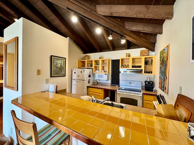 kitchen with white appliances, vaulted ceiling with beams, wooden ceiling, sink, and track lighting