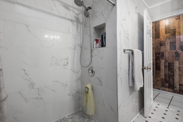 bathroom featuring tiled shower