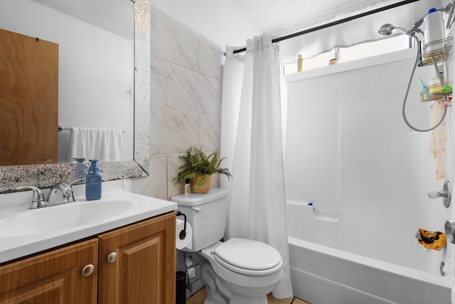 full bathroom with vanity, toilet, and shower / tub combo with curtain