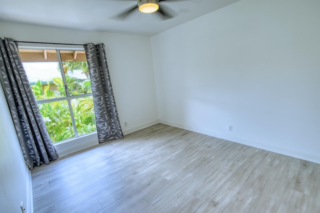 480 Kenolio Rd Unit 23-202, Kihei, HI 96753 - spare room featuring wood finished floors and a ceiling fan