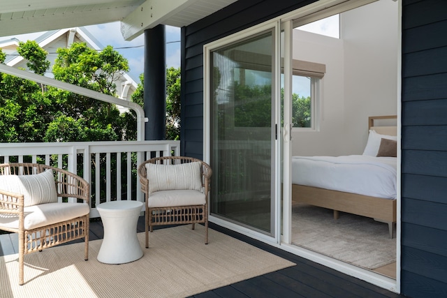 view of wooden balcony with a wooden deck