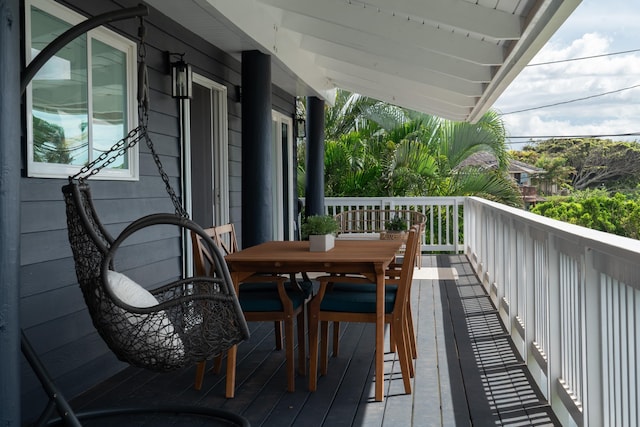 balcony featuring outdoor dining area