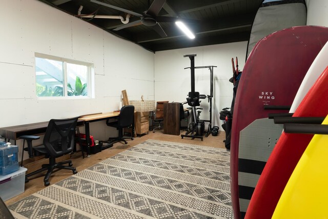 office space with unfinished concrete floors