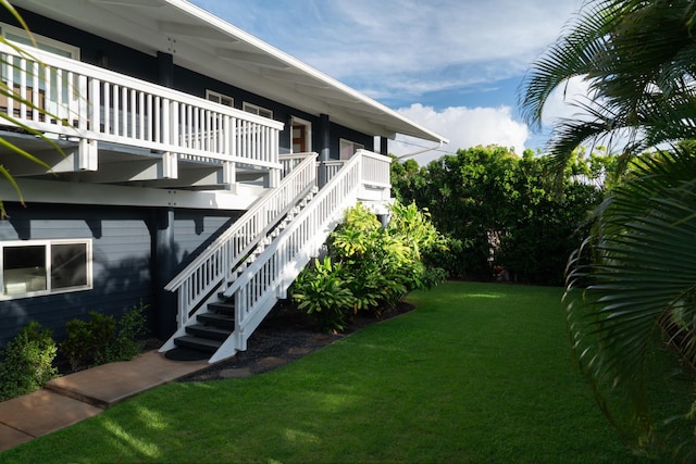 view of yard featuring stairway