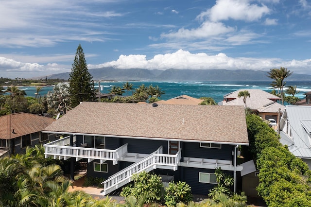 birds eye view of property featuring a mountain view