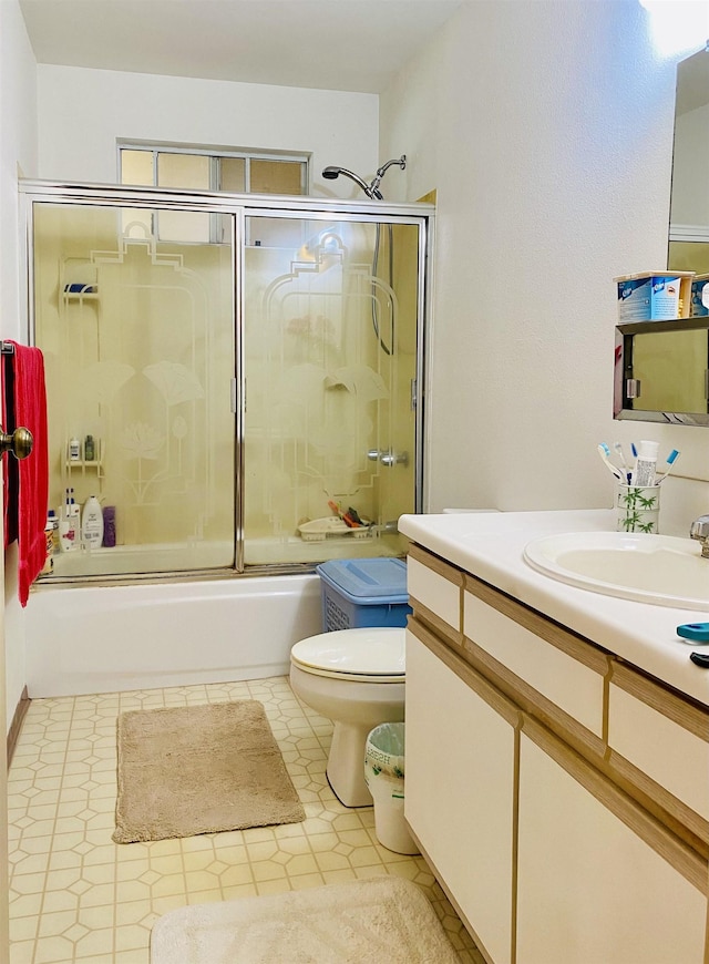 337 Ahakea St, Lanai City, HI 96763 - full bathroom featuring vanity, shower / bath combination with glass door, and toilet