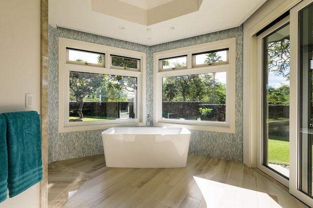 sunroom featuring plenty of natural light