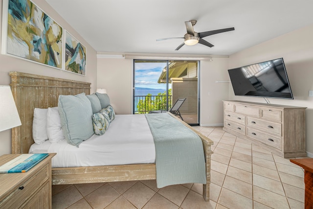 tiled bedroom with ceiling fan and access to outside