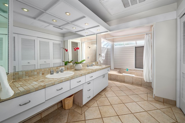 bathroom featuring tile patterned floors, vanity, and coffered ceiling