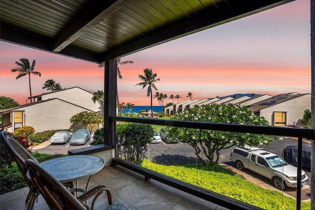 balcony at dusk with a water view