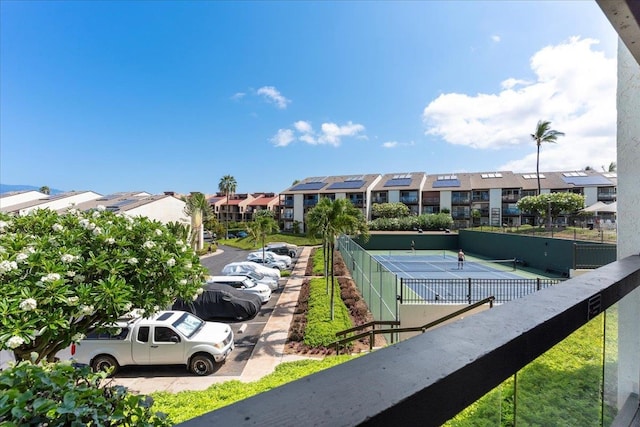 exterior space with tennis court