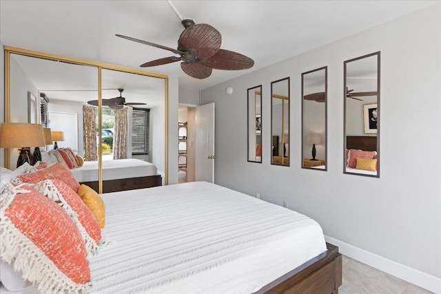 bedroom featuring ceiling fan and a closet