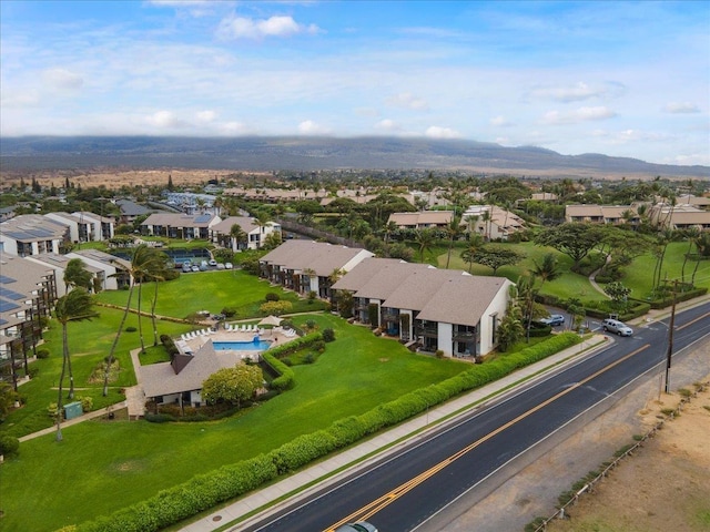 2737 S Kihei Rd Unit 160, Kihei, HI 96753 - aerial view of residential area featuring a pool and a mountainous background