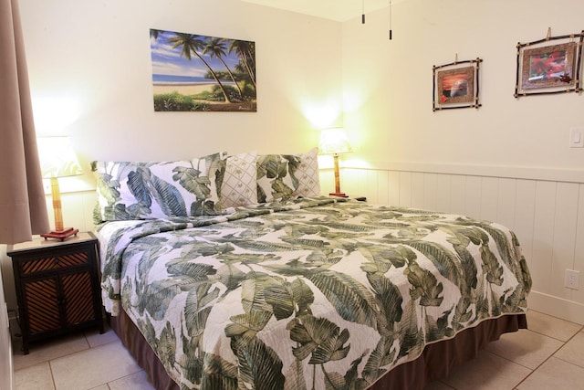 115 N Kihei Rd Unit A3, Kihei, HI 96753 - bedroom featuring tile patterned floors and wainscoting