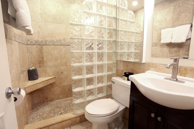 115 N Kihei Rd Unit A3, Kihei, HI 96753 - bathroom with a walk in shower, vanity, and tile walls