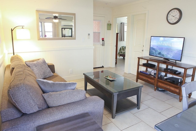 115 N Kihei Rd Unit A3, Kihei, HI 96753 - living area with light tile patterned flooring, a wainscoted wall, and a ceiling fan