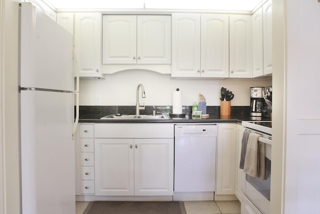 115 N Kihei Rd Unit A3, Kihei, HI 96753 - kitchen featuring white appliances, dark countertops, white cabinetry, and light tile patterned floors