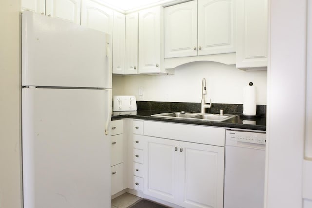 115 N Kihei Rd Unit A3, Kihei, HI 96753 - kitchen featuring white appliances, dark countertops, and white cabinets