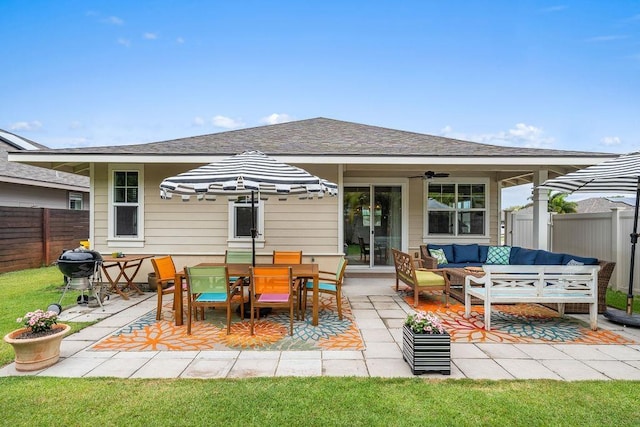 back of house featuring an outdoor hangout area, a yard, and a patio