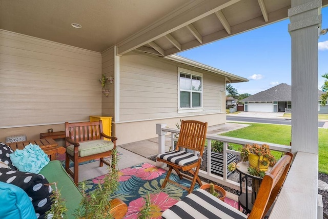 view of patio featuring a porch