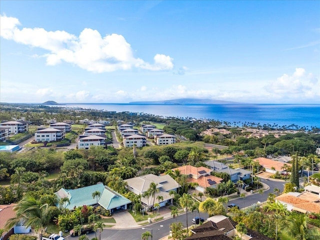 bird's eye view featuring a residential view and a water view