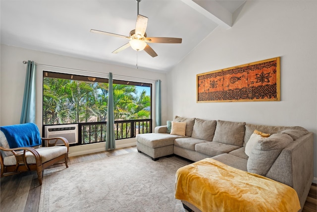 15 Kulanihakoi St Unit 9F, Kihei, HI 96753 - living room with wood finished floors, ceiling fan, beam ceiling, and high vaulted ceiling
