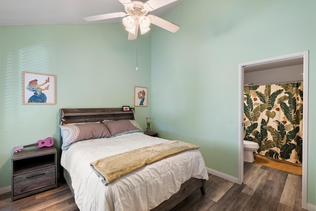 15 Kulanihakoi St Unit 9F, Kihei, HI 96753 - bedroom with high vaulted ceiling, baseboards, wood finished floors, and ceiling fan