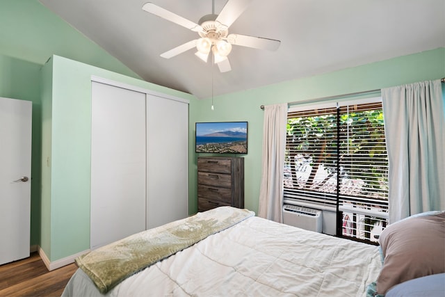 15 Kulanihakoi St Unit 9F, Kihei, HI 96753 - bedroom featuring wood finished floors, vaulted ceiling, a closet, and a ceiling fan