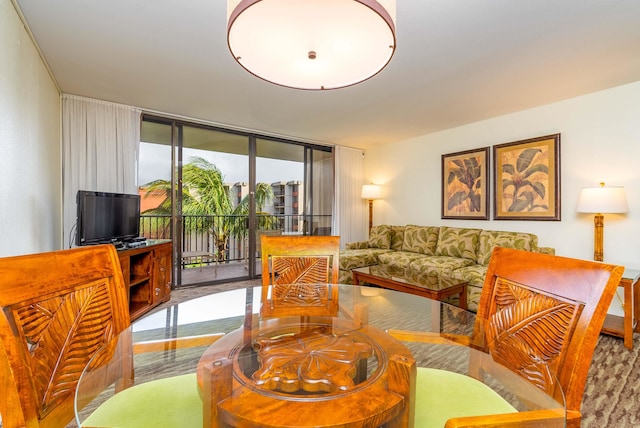 living room with a wall of windows